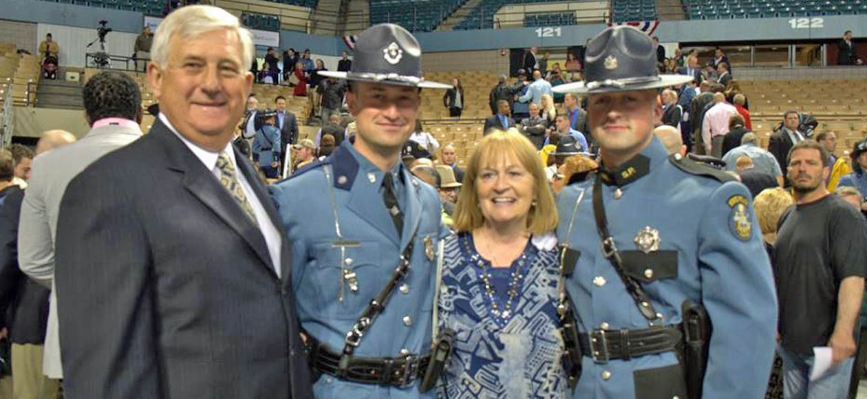 The Coflesky family at Mike's 2014 Massachusetts State Police graduation. Pictured left-to-right are father, John, Mike, mother, Mary, and Dave.