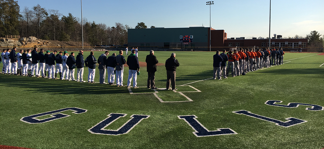 Both the Endicott and Salem State baseball teams take part in the national anthem on North Field.