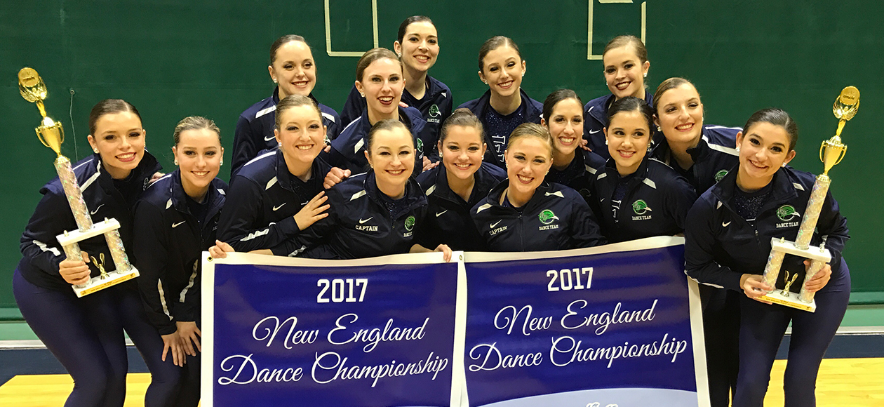 The Endicott dance team showcases their championship trophies at New England Regionals.