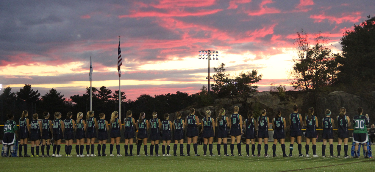 Endicott field hockey team during a night game prior to the start of the match.