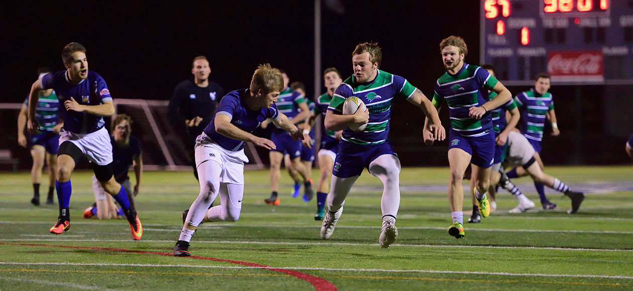 Men's rugby game action.