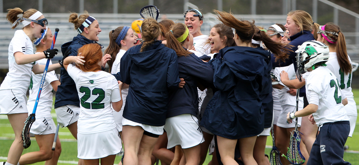 The 2014 women's lacrosse team celebrates, after claiming their ninth consecutive CCC title. Photo courtesy of David Le.