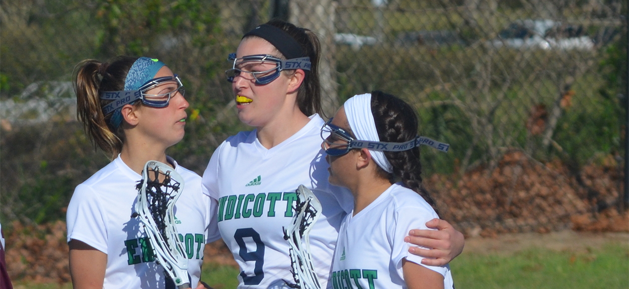 The Endicott women's lacrosse team celebrates Dutchyshyn's goal.