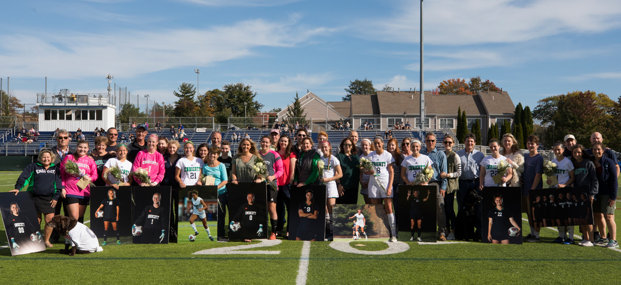 Image of Endicott women's soccer seniors and their families before the start of the match.