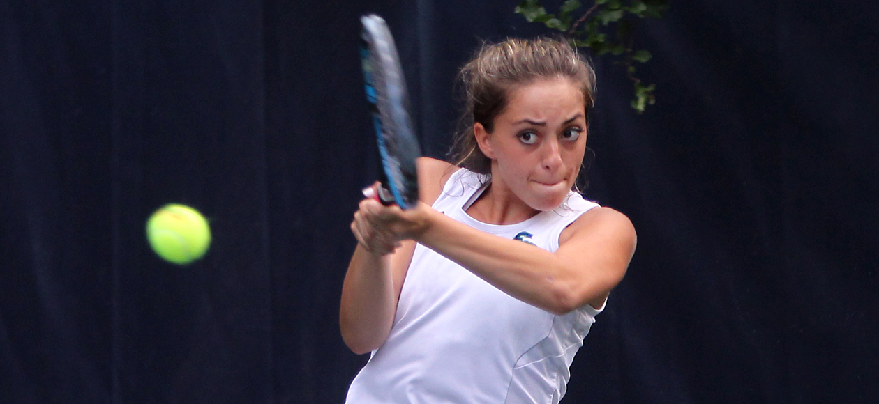 Alexi Losano hits a forehand with a tennis racket.