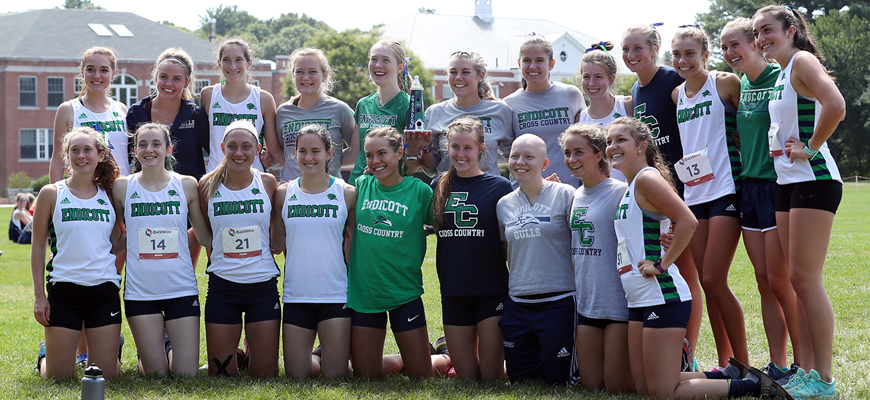 Women's cross country team poses for a photo.