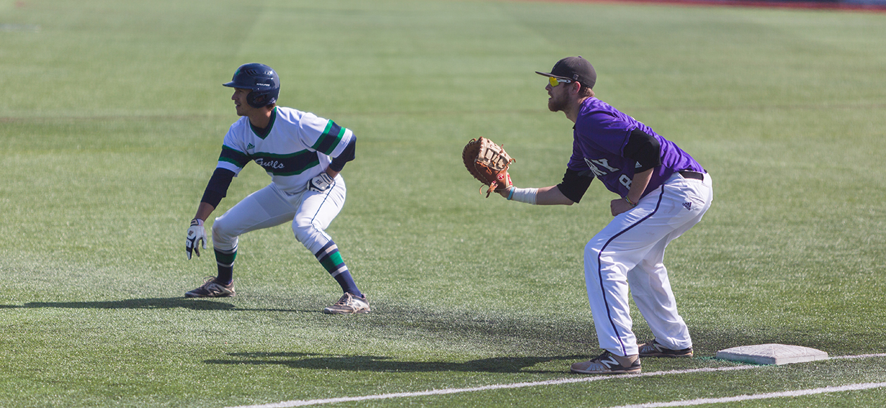Nick Berno takes a lead at first base against Curry.