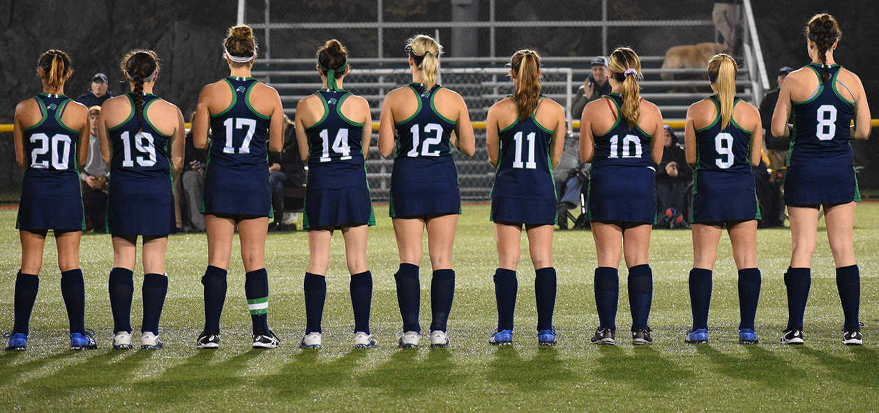 Members of the Endicott field hockey team stand for the National Anthem.