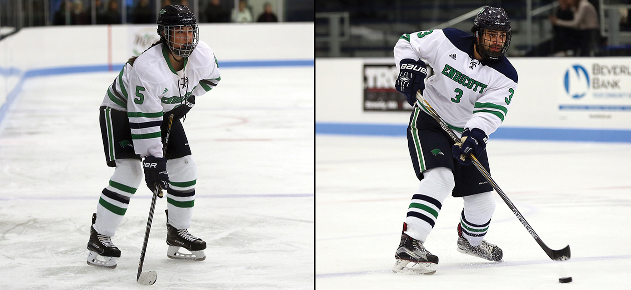 Madison Huber awaits for action to start, while Ryan Dougherty passes the puck to a teammate from the blue line.