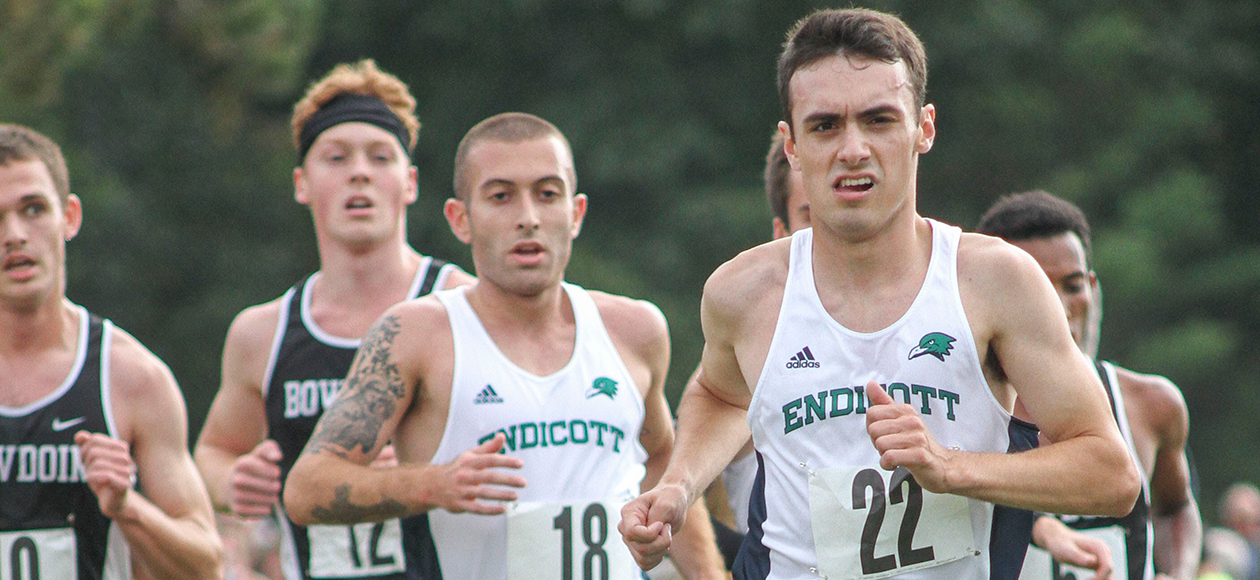 Zach Marshall and Patrick Finocchiaro lead a pack during a cross country race.