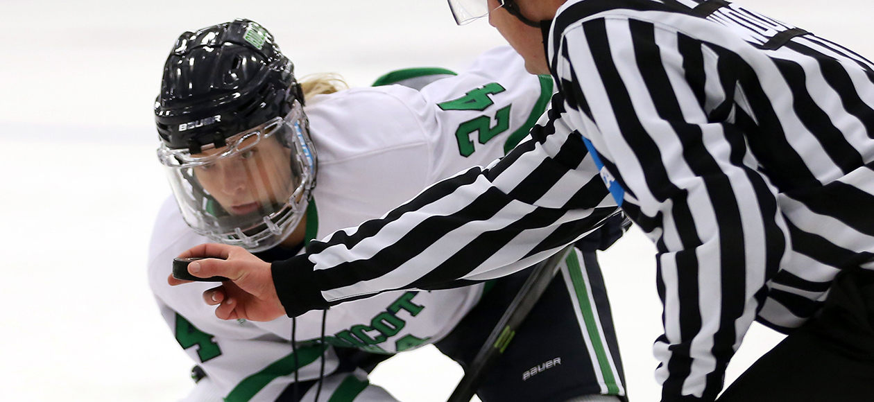 Teneal Perry focuses in on a puck before it is dropped for a faceoff.