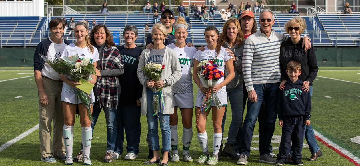 Image of the Endicott women's soccer seniors and their respective families. 