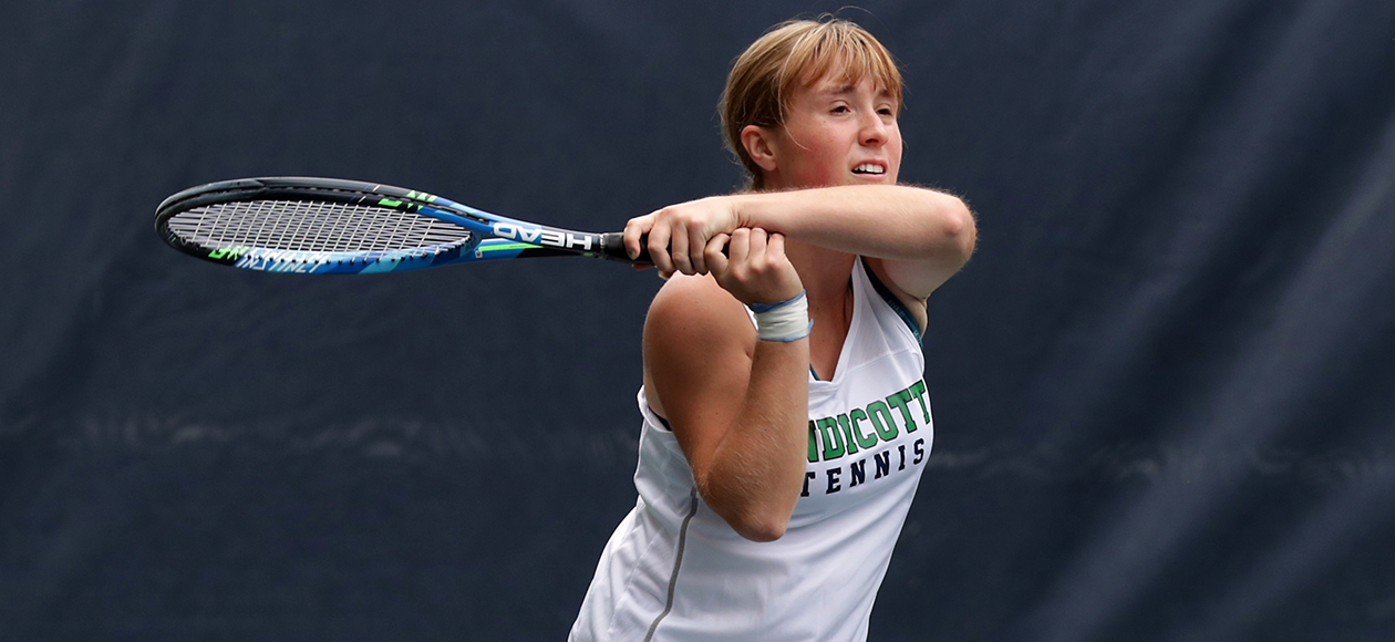 Justine Hoover swings a tennis racket.