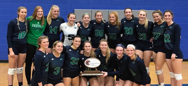 The Endicott women's volleyball team poses with the CCC trophy after defeating Roger Williams 3-2.