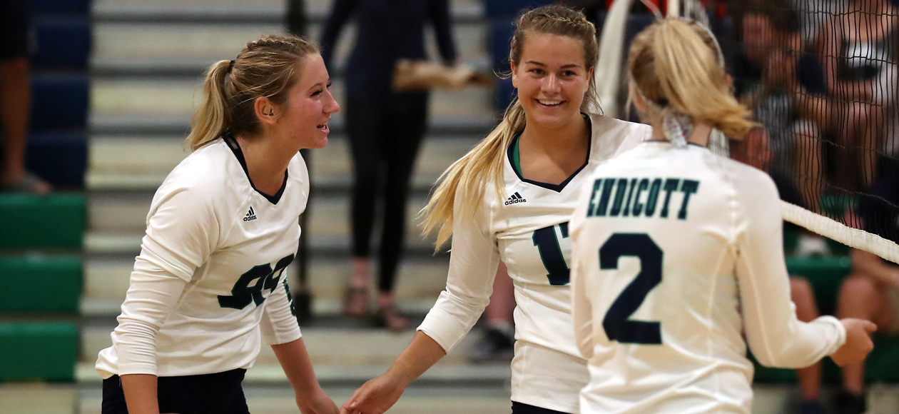 Alex Dippel, Nicole Winkler and Remi Quesnelle celebrate a kill for Winkler.