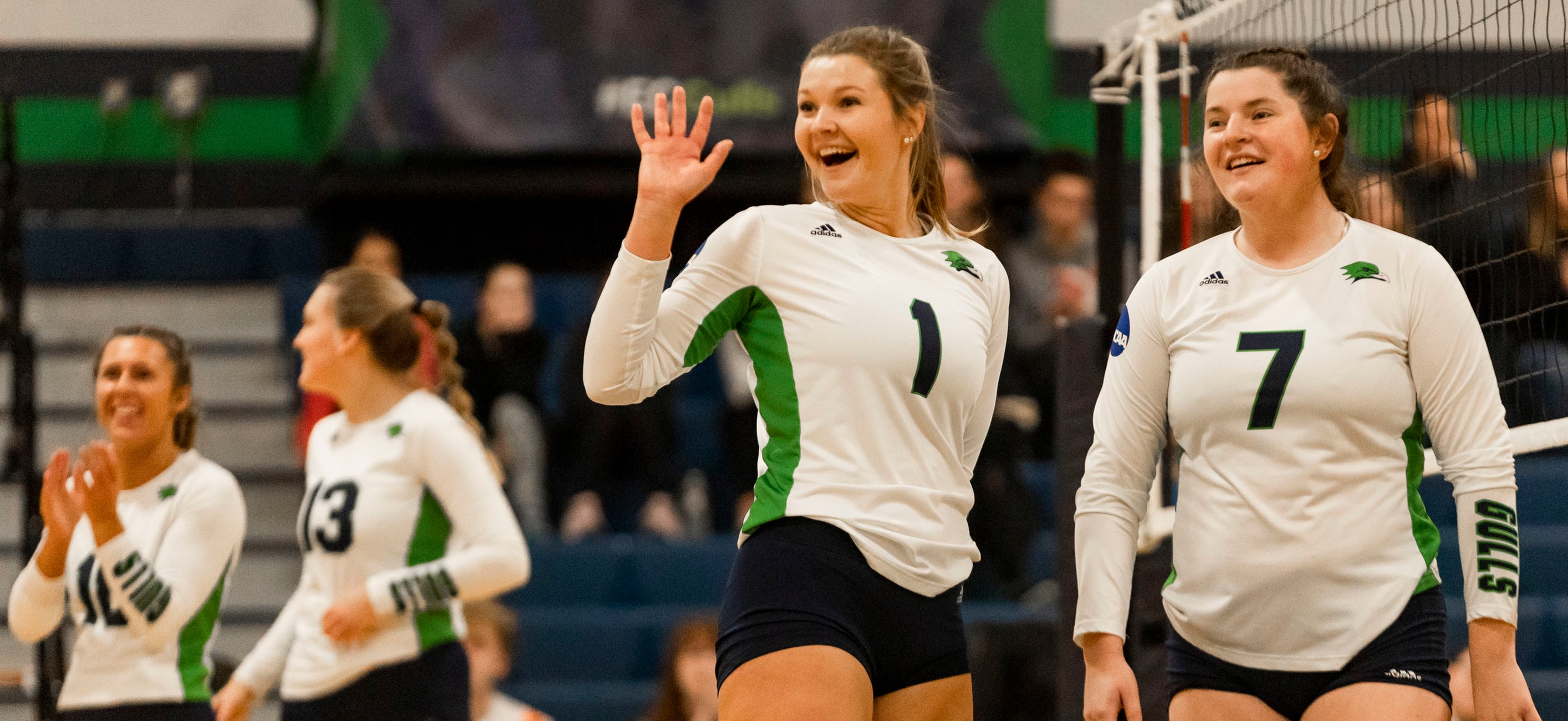 Amanda Gilbert waves after being acknowledged for her 1,000th career kill.